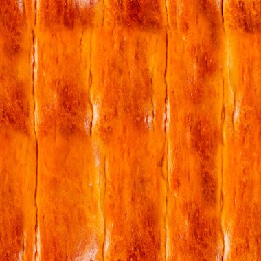 Pişmiş çıtır çizgili çörek yüzeyinin pürüzsüz 4k fotoğraf dokusu.