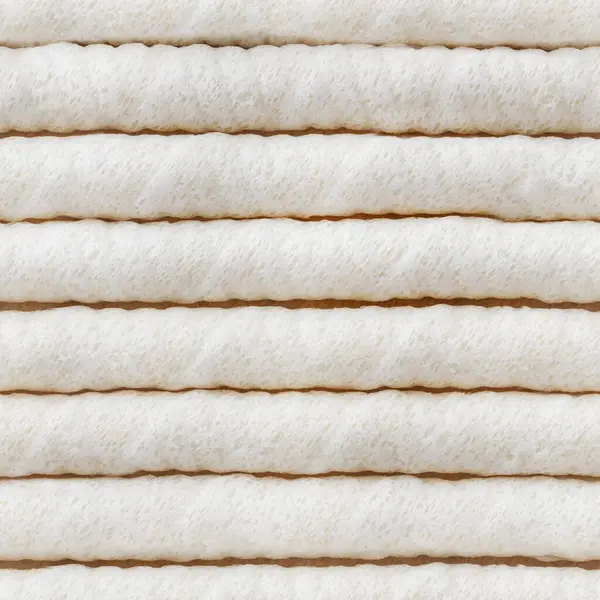 Kremalı waffle tüplerinin kusursuz 4k fotoğraf deseni.