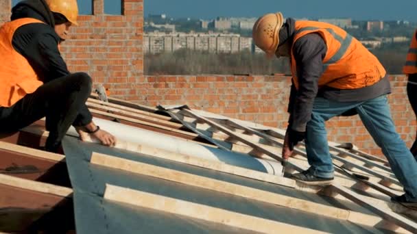 Construction Worker Wearing Safety Harness Belt Working Roof Structure Building — Stock Video