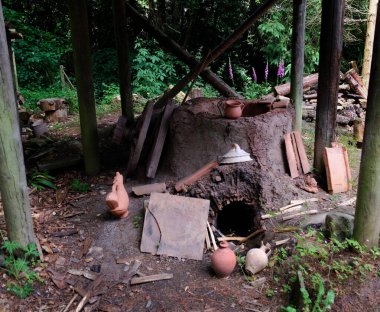 Vindolanda, Hexham. Northumberland, UK. June 2024. Roman fort excavations and Roman Army museum. pottery kiln replica. clipart