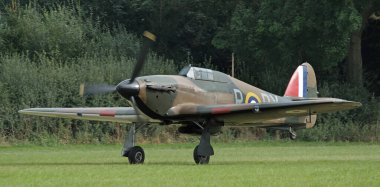 Zafer Şovu, Leicester, İngiltere. Ağustos 2024, Hawker Kasırgası, 1930 'larda tasarlanan ve ağırlıklı olarak Kraliyet Hava Kuvvetleri' ne hizmet etmek üzere Hawker Aircraft Ltd..