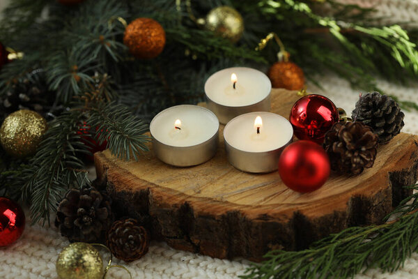Wooden natural background with christmas decoration and candles