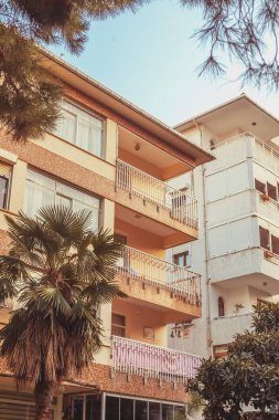 Old apartment building on sky background. Residential block of flats house