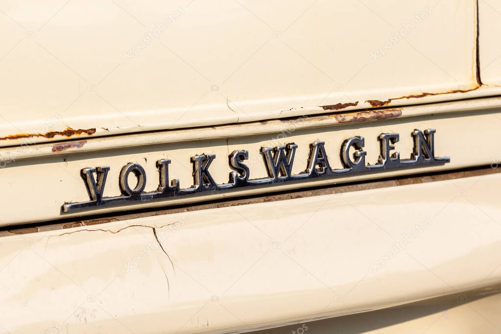BANGKOK, THAILAND - March 4, 2024: VOLKSWAGEN old rusty text sign. Classic Emblem. Car logo