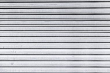  Araç paten kapısı dokusu. Arka planda kayan kapı panjuru. Galvanize metal yaprak dokusu