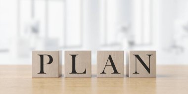 Ofisteki iş konsepti PLAN küpleri mavi arka planda. 3d oluşturma