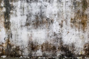 Lekeli ve desenli eskimiş beton duvar..