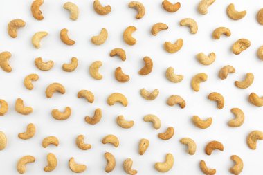 pattern of cashew nuts on white background, snack food concept