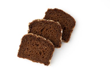 three slices of rye bread isolated on white background, top view, fresh delicious homemade healthy baking