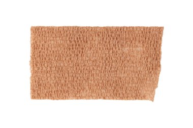 piece of adhesive medical elastic bandage isolated on white background, top view