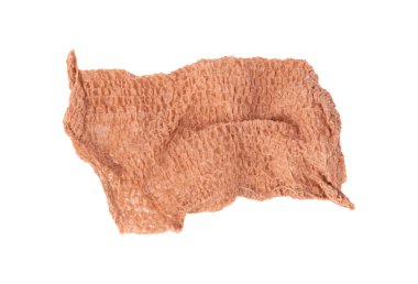 Yapışkan tıbbi elastik bandaj parçası kesme yolu ile beyaz arkaplanda izole edilmiş, üst görünüm