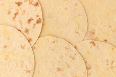 Buğday yuvarlak taco tortilla veya Pita lavash Yuvarlak düz ekmek, Meksika tortilla arka planı