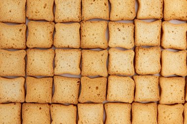 Tam buğday tostları, kızarmış ekmek dilimleri veya arka plan olarak ruslar, üst görünüm