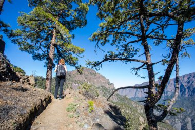 Young woman summit to Bejenado Peak in Caldera De Taburiente, La Palma, Canary Islands, Spain