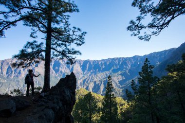Young woman summit to Bejenado Peak in Caldera De Taburiente, La Palma, Canary Islands, Spain