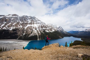 Young woman in Peyto lake, Banff National Park in Canada