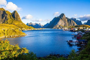 A beautiful sunrise over the picturesque village of Reine in Lofoten Islands, Norway. clipart