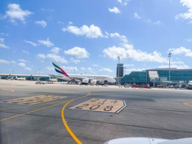 Barcelona, Spain; September 6 2024: Pre-flight preparations of a large passenger jet at an international airport, highlighting the magnitude of contemporary air travel