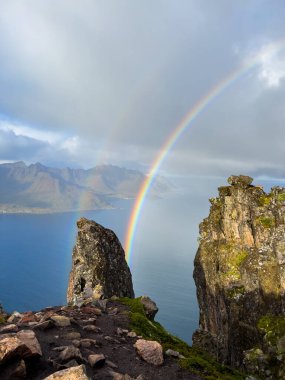 Stunning autumn landscape of Segla Mountain in Senja Island, Norway, with dramatic cliffs and fjords. clipart