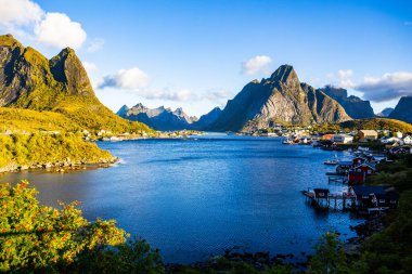 A beautiful sunrise over the picturesque village of Reine in Lofoten Islands, Norway. clipart