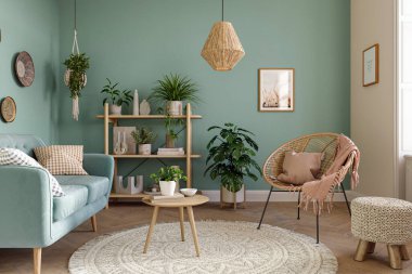 Açık renkli, mavi koltuklu, ahşap mobilyalı ve güzel dekorlu rahat bir ev. Duvar maketi, 3D görüntüleme