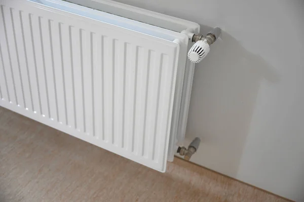 White Radiator Attached Wall Providing Warmth Comfort Room Its Smooth Stock Picture