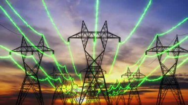 Yüksek voltajlı güç pilonları elektrik iletir. Gün batımında elektrik iletim kuleleri