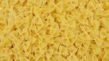 Pasta Farfalle or Bow-Tie pasta. Traditional Italian cuisine. Finest durum wheat pasta, view from above
