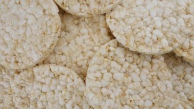 Puffed round rice cakes, diet healthy food concept. Close up view from above.