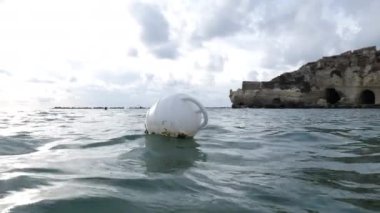 Floating buoy on the water surface