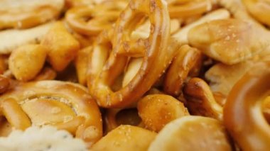 Pretzels. Salty snacks with poppy seeds. Close up view