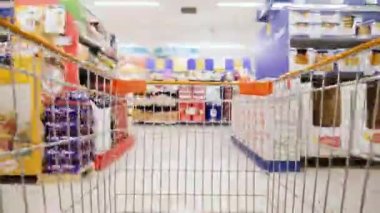Shopping cart. Searching for groceries, timelapse POV