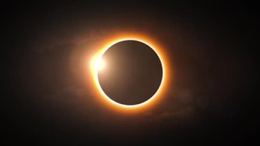 Solar eclipse. Moon closes the Sun. Seamless loop realistic animation