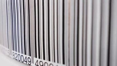 Retail label barcode scanning, close-up view