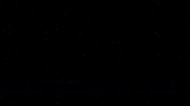 Küçük toz parçacıkları yavaşça hareket ediyor, siyah arkaplanda izole bir şekilde. Havada ya da suda yüzen toz. Kusursuz döngü, örtüşür