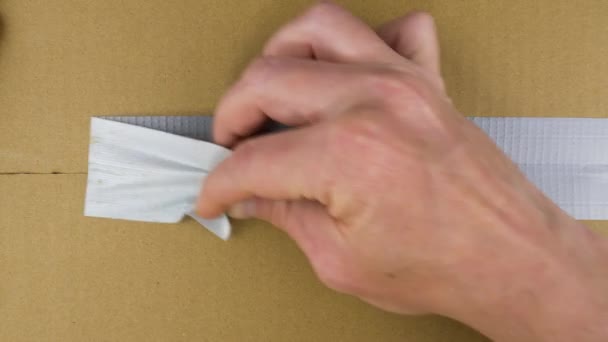 Unpacking Carton Box Chromakey Hand Tears Adhesive Tape Cardboard Box — Stock Video
