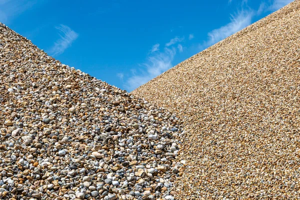 Abundance Pebbles Sorted Small Large Piles Blue Sky Overhead — Stock Photo, Image
