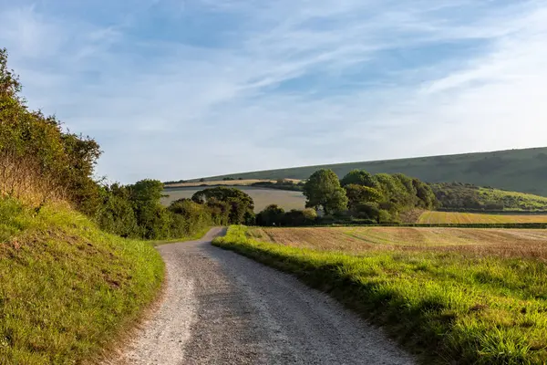 stock image Looking along a country road in the South Downs, on a sunny late summer's  evening