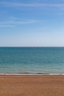 A view of the pebble beach and ocean, at Brighton on the Sussex coast