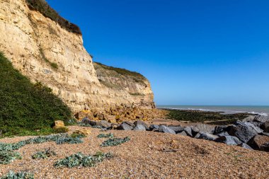 Pett Level beach and cliffs on a sunny September day