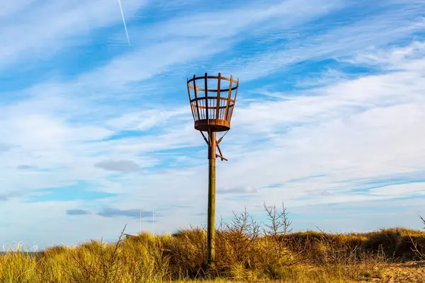 A fire beacon on the Lincolnshire coast, on a sunny winter\'s day