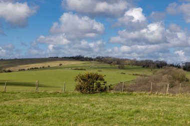 A rural Sussex view near Lewes, on a sunny early spring day clipart