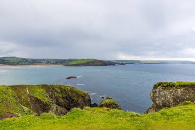 Looking back towards Bigbury-on-sea, from Burgh island off the Devon coast clipart