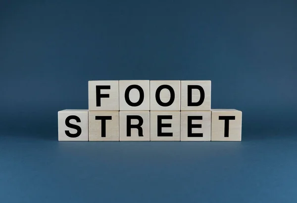 Food street. Cubes form the word Food Street. Street fast food word concept