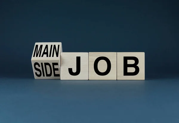 Main or Side Job. The cubes form the selection words Main or Side Job. Main or Side Job concept