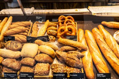 Vienna, Austria - October 14, 2022: Bakery shop with vegan bread and baguette in Naschmarkt, street food market in Vienna, Austria