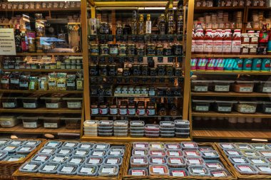 Vienna, Austria - October 14, 2022: Spice and flavor shop with sauce with truffle in Naschmarkt, street food market in Vienna, Austria