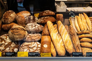 Vienna, Austria - October 14, 2022: Bakery shop with vegan bread and baguette in Naschmarkt, street food market in Vienna, Austria