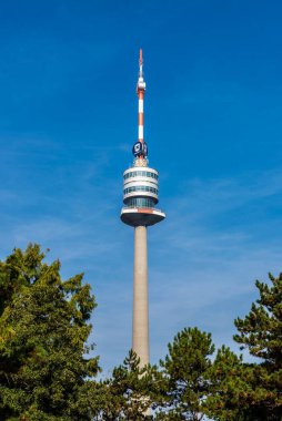 Vienna, Austria - October 17, 2022: Donauturm or Danube Tower, telecommunications tower with a Novomatic advertisement in Donau City or Vienna DC, Vienna, Austria
