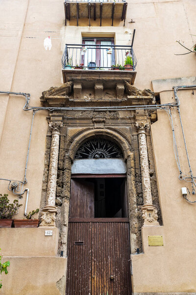 Facade of the old classic building of Portale del Gagini in the old town of Agrigento, Sicily, Italy